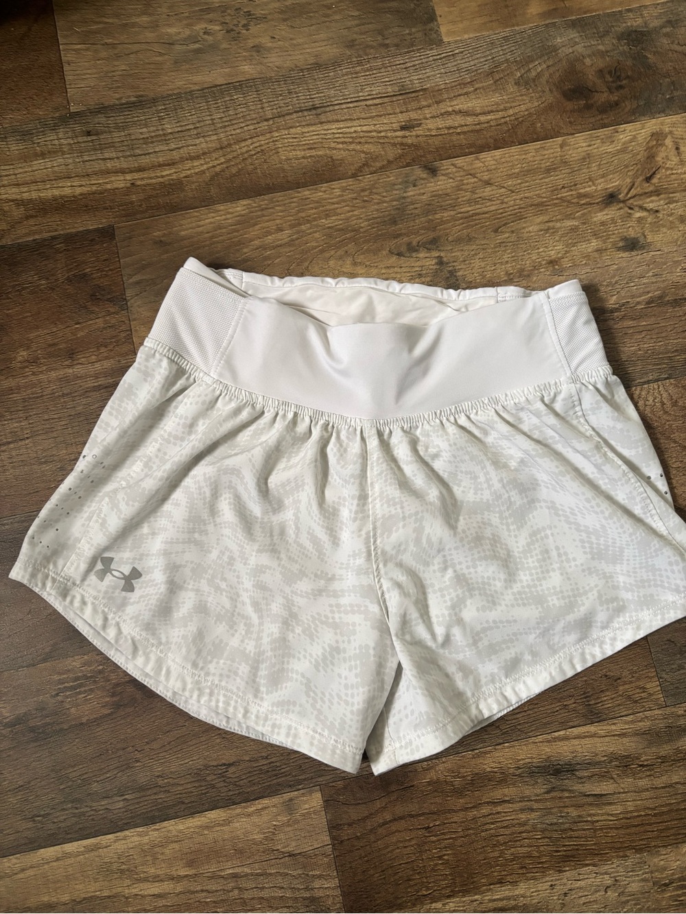 Under Armour Women's White Athletic Shorts with Subtle Pattern